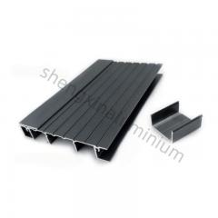 Close-up of black aluminium deck balusters installed on a modern aluminium decking