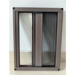 Pleated screen door installed on a modern patio entrance
