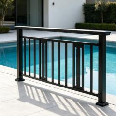 Aluminum fence panels with matching post kit installed in a modern residential backyard