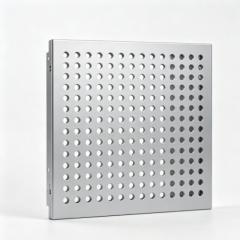 Punched aluminium panel with regular circular hole pattern for facade cladding